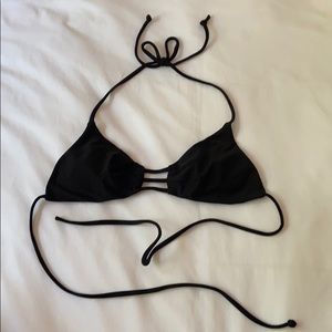 Black bikini top. String ties.
